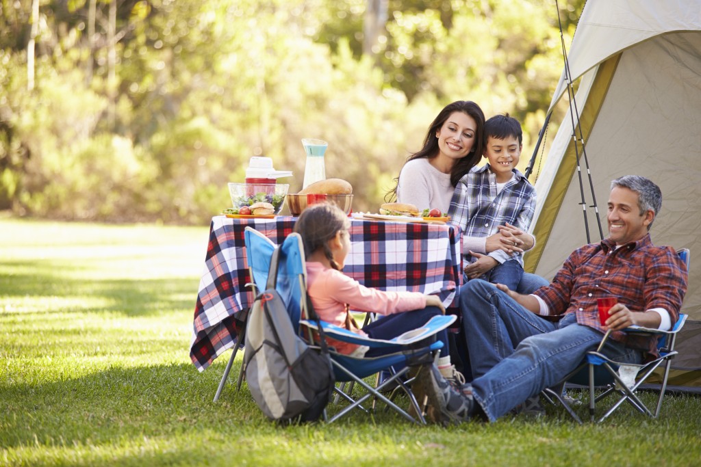 a family enjoying camping